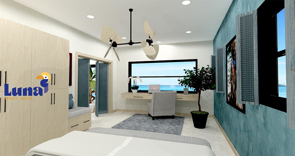 Modern bedroom with ocean view and desk.