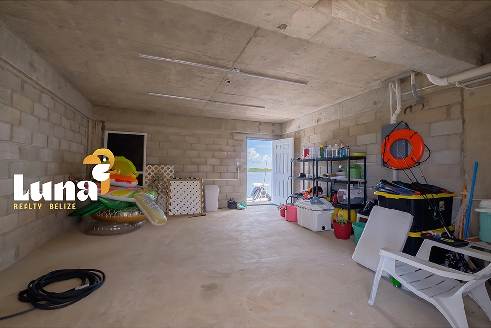 Basement storage with various items and equipment.