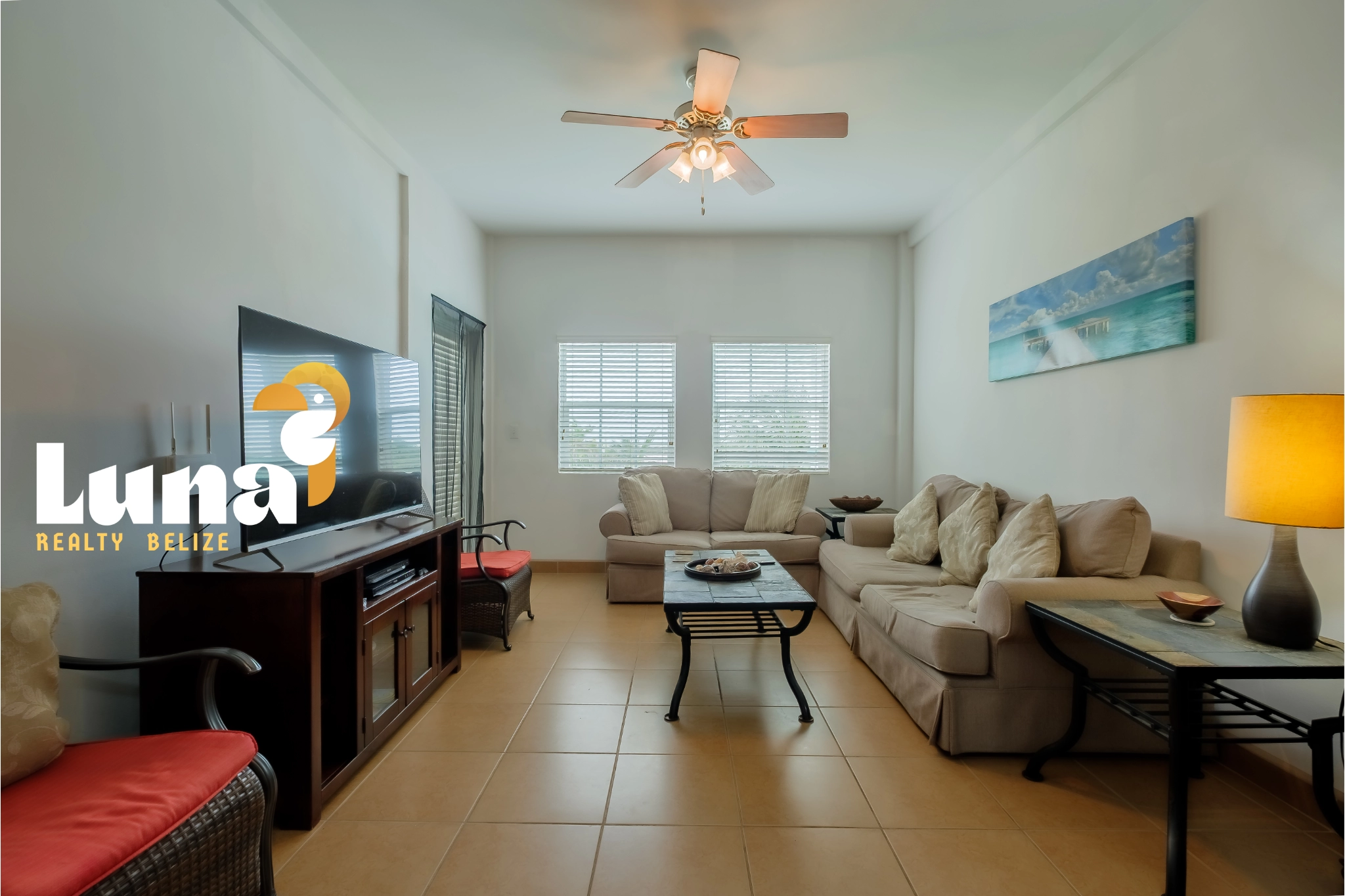 Modern living room with beige furniture set.