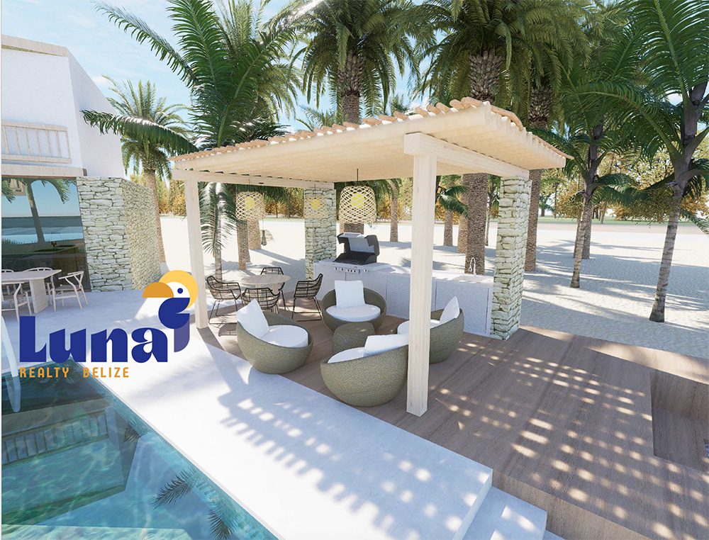 Beachfront lounge area with palm trees.