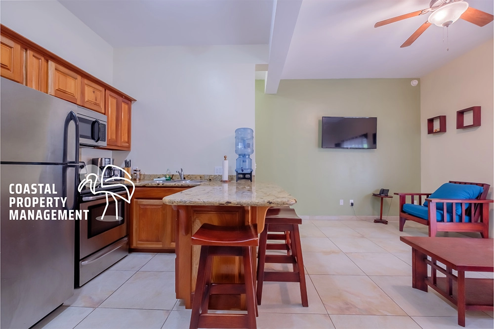 Kitchen and living area with modern decor.