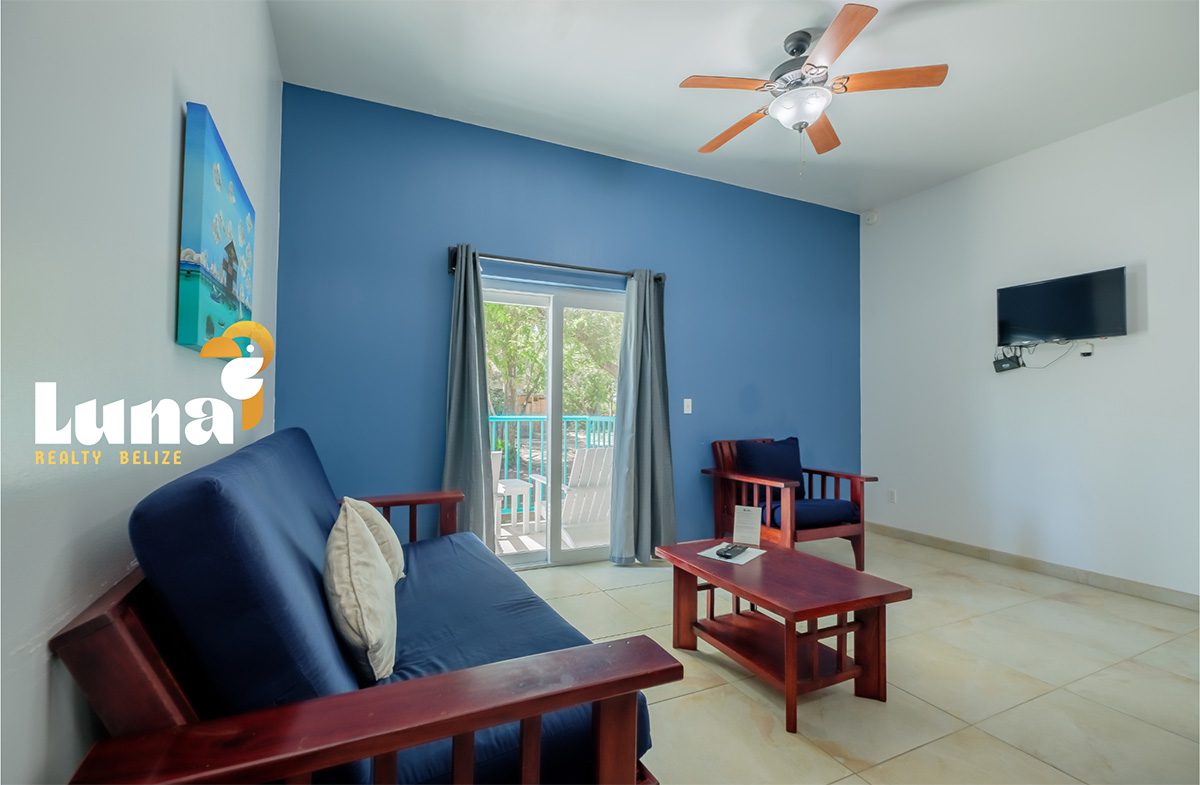 Living room with blue accent wall.