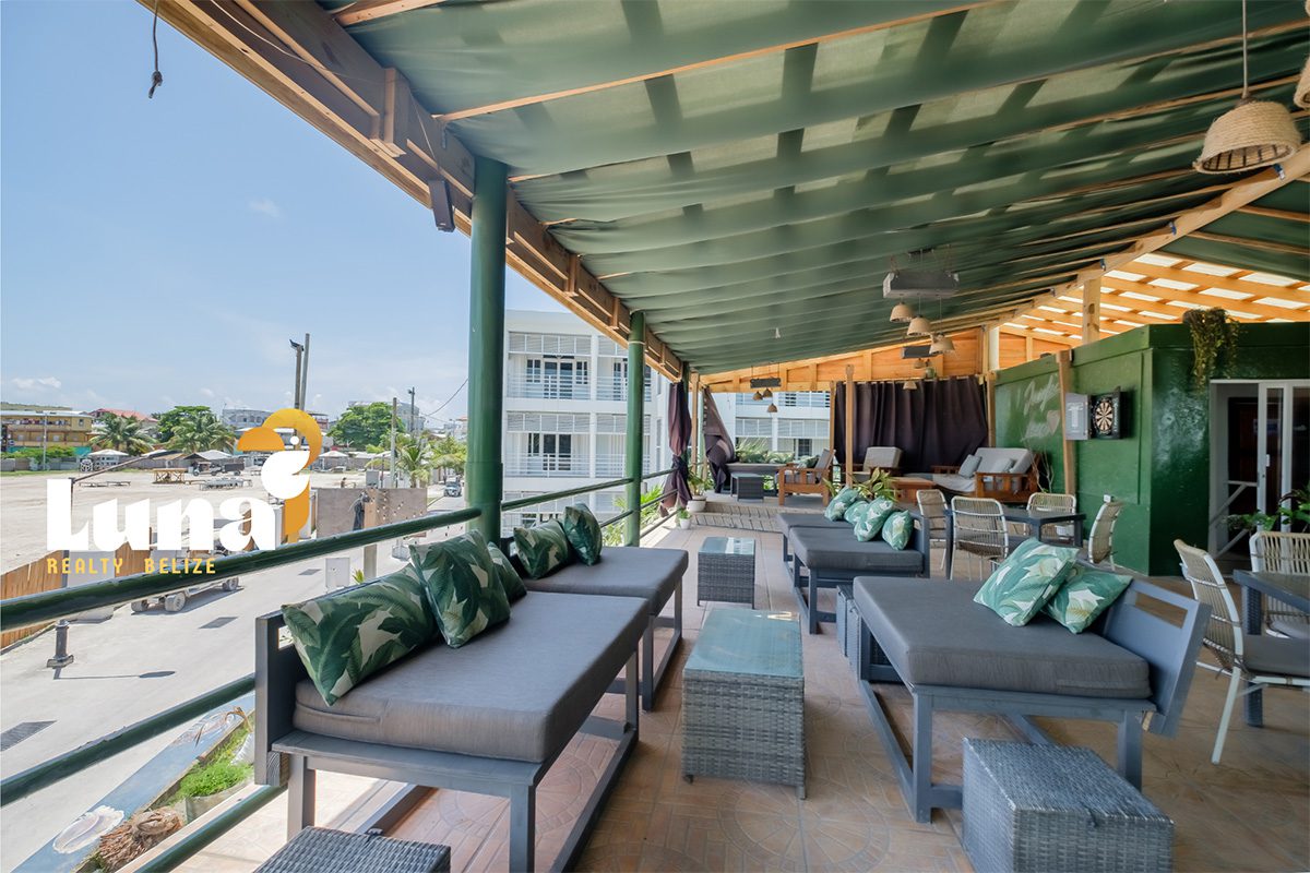 Outdoor seating area with green decor.