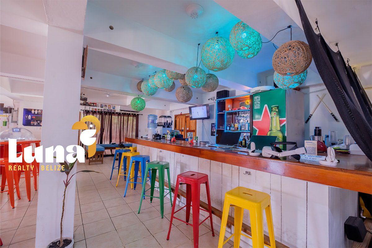 Colorful bar with hanging spherical lights.
