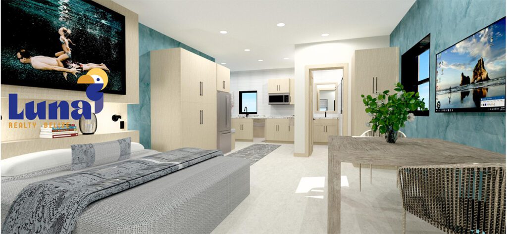 Modern hotel room with kitchenette and artwork.