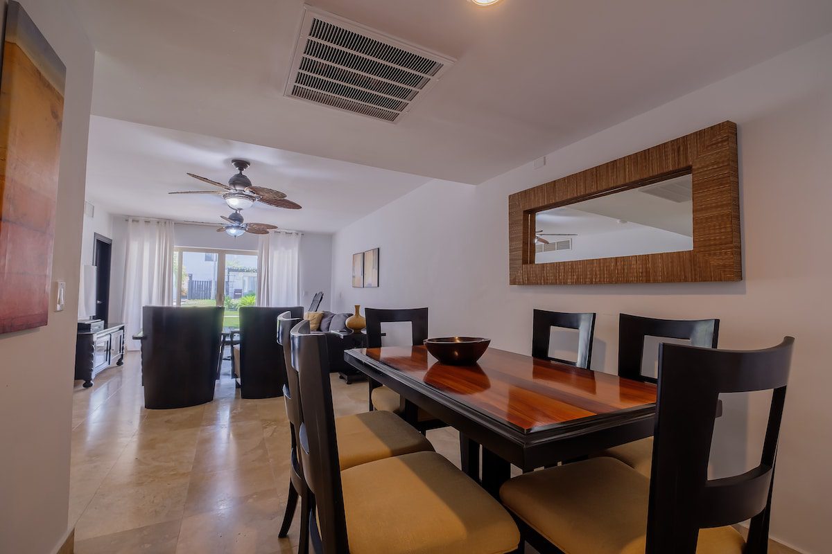 Dining area with table and chairs.