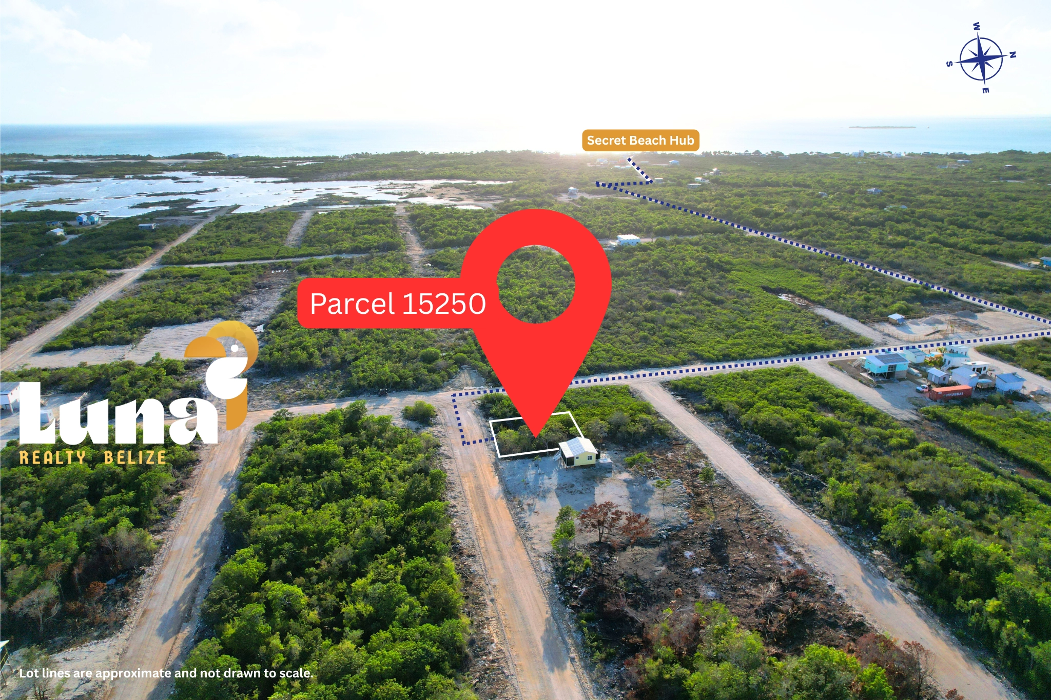 Aerial view of land parcel with marker.