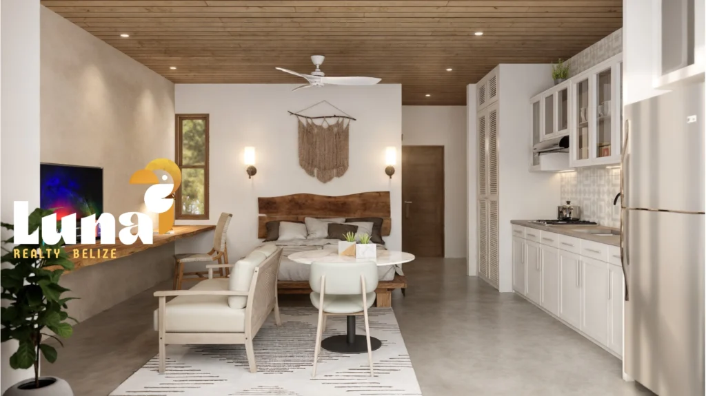 Modern living room with kitchen and seating area.
