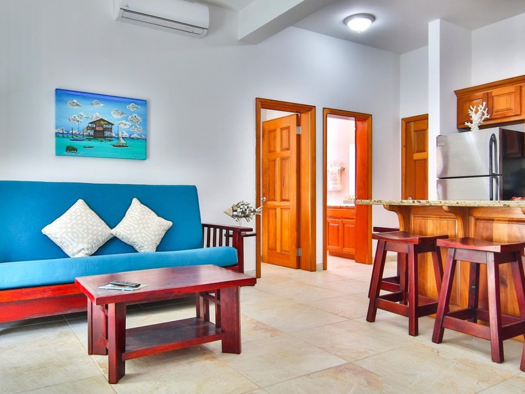 Properties include E103, C203, A301, F103, and other units with varied sizes and prices